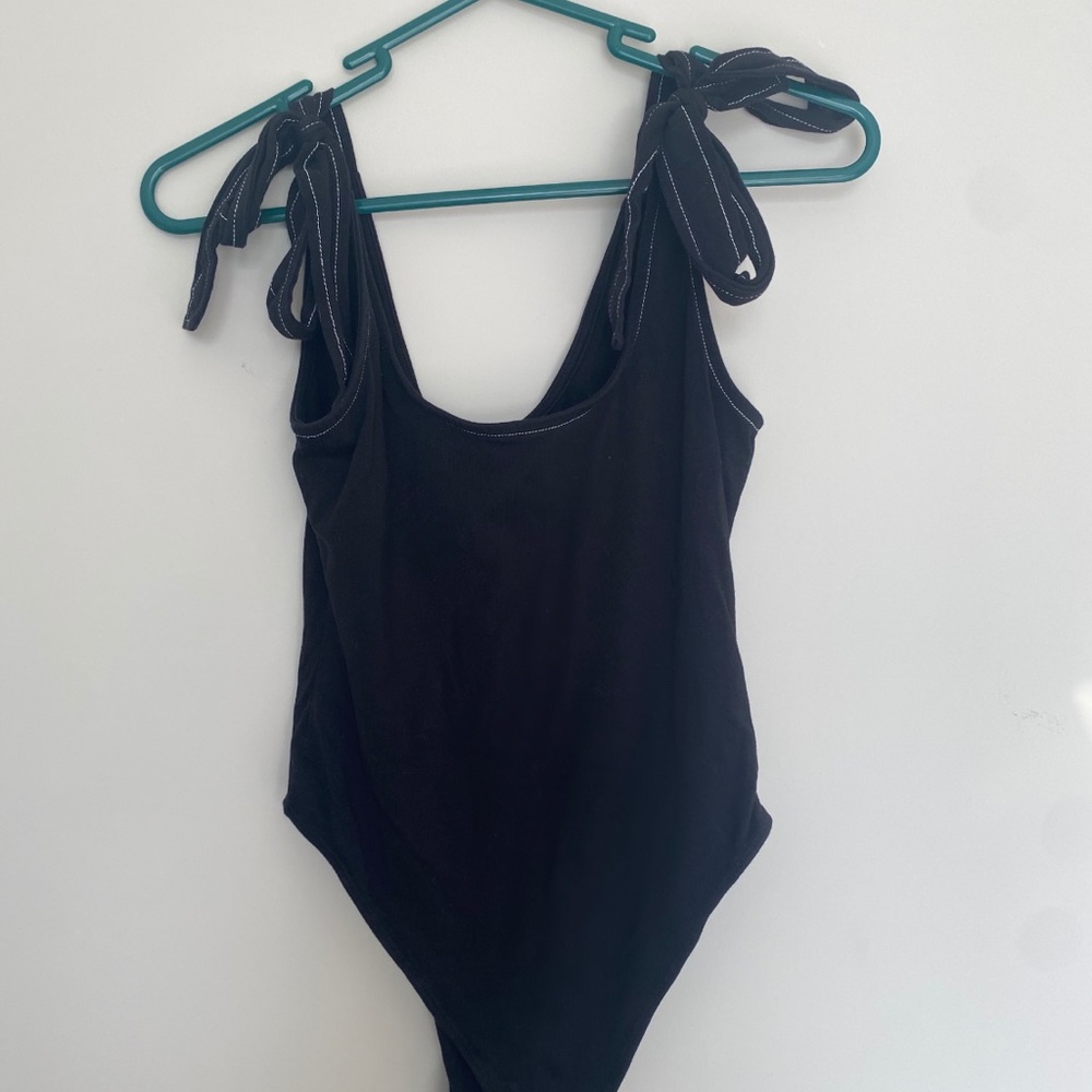 Black bodysuit with bow ties at shoulder